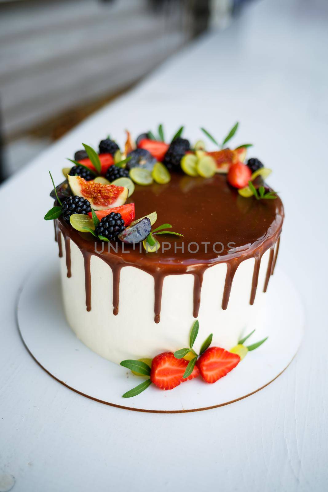 Big sweet wedding cake for newlyweds