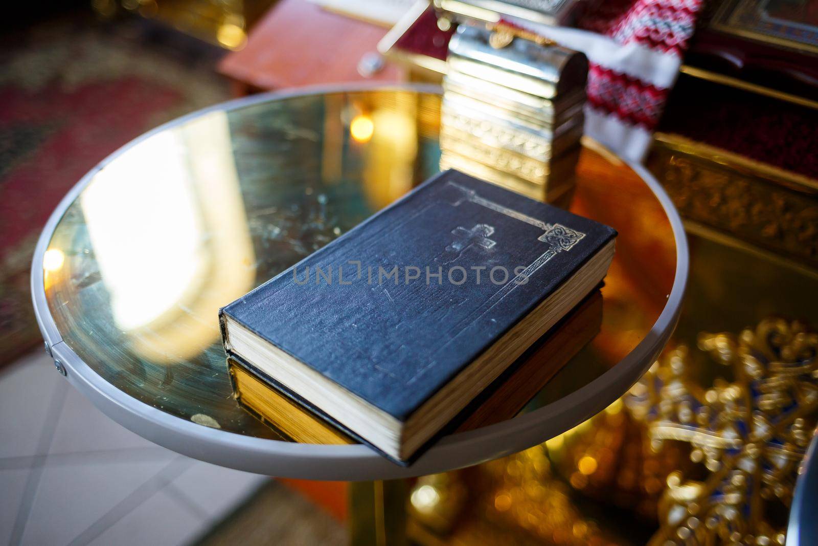 Orthodox religion. Hands of the priest on the bible.