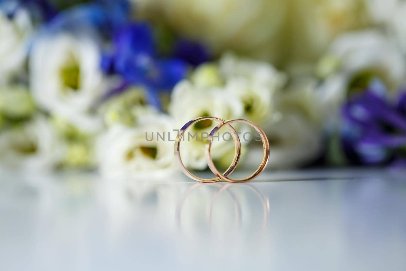 Wedding theme, beautiful wedding rings, bridal bouquet by Dmitrytph