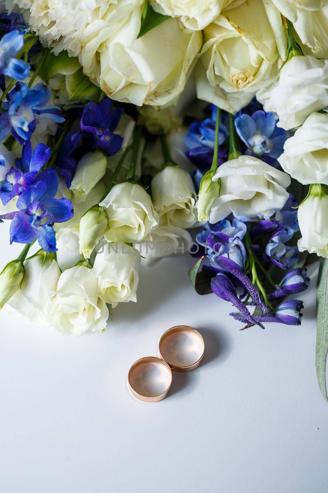 Wedding theme, beautiful wedding rings, bridal bouquet by Dmitrytph