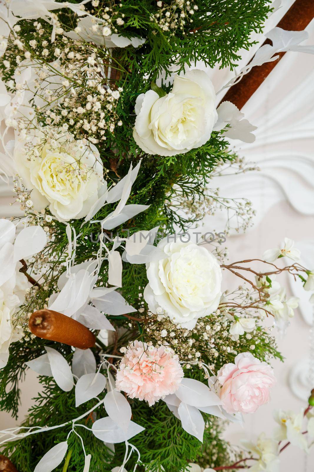 Wedding decor made of flowers and fabric. Beautiful decorations for newlyweds on their wedding day by Dmitrytph