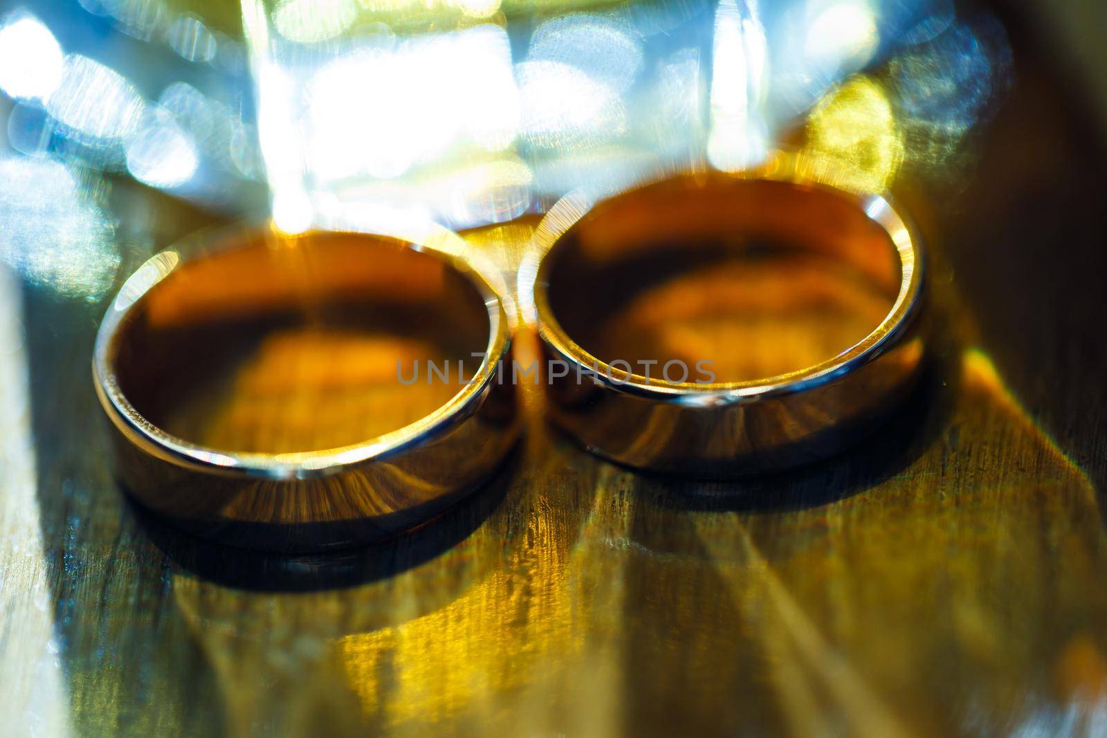 Gold wedding rings for newlyweds on wedding day