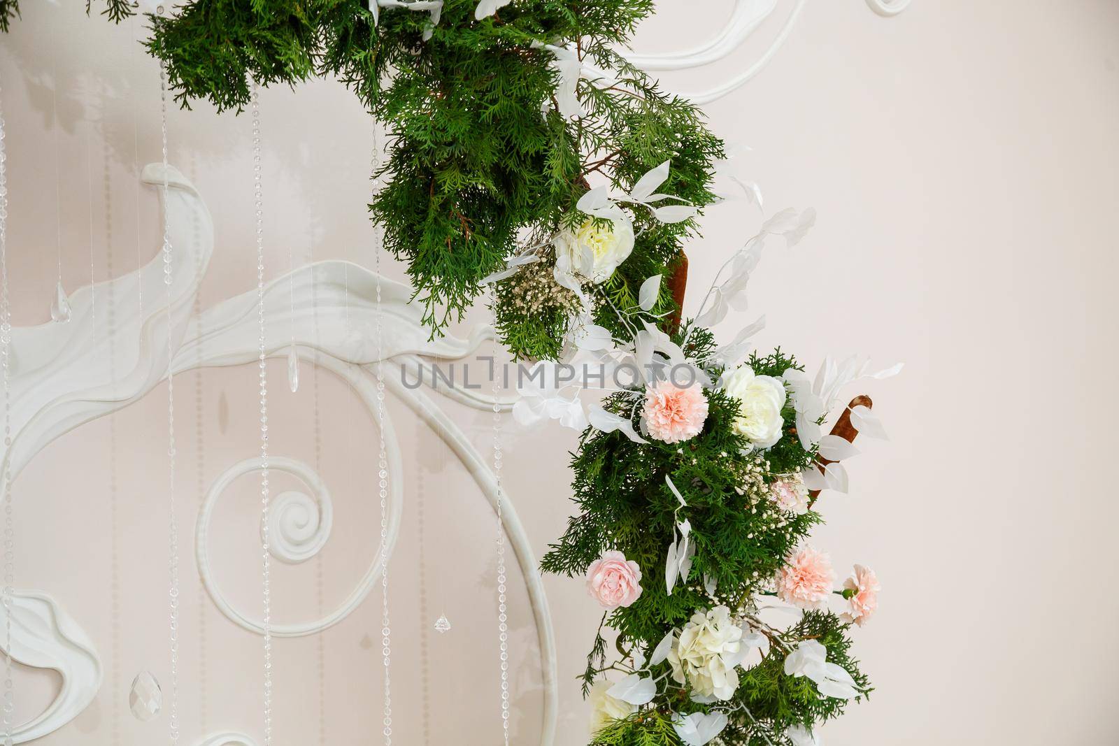 Wedding decor made of flowers and fabric. Beautiful decorations for newlyweds on their wedding day by Dmitrytph