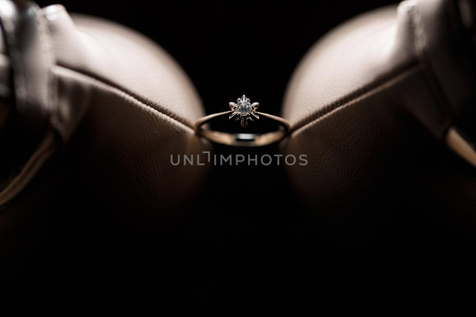 Bride's engagement ring on wedding day with beautiful holiday shoes by Dmitrytph