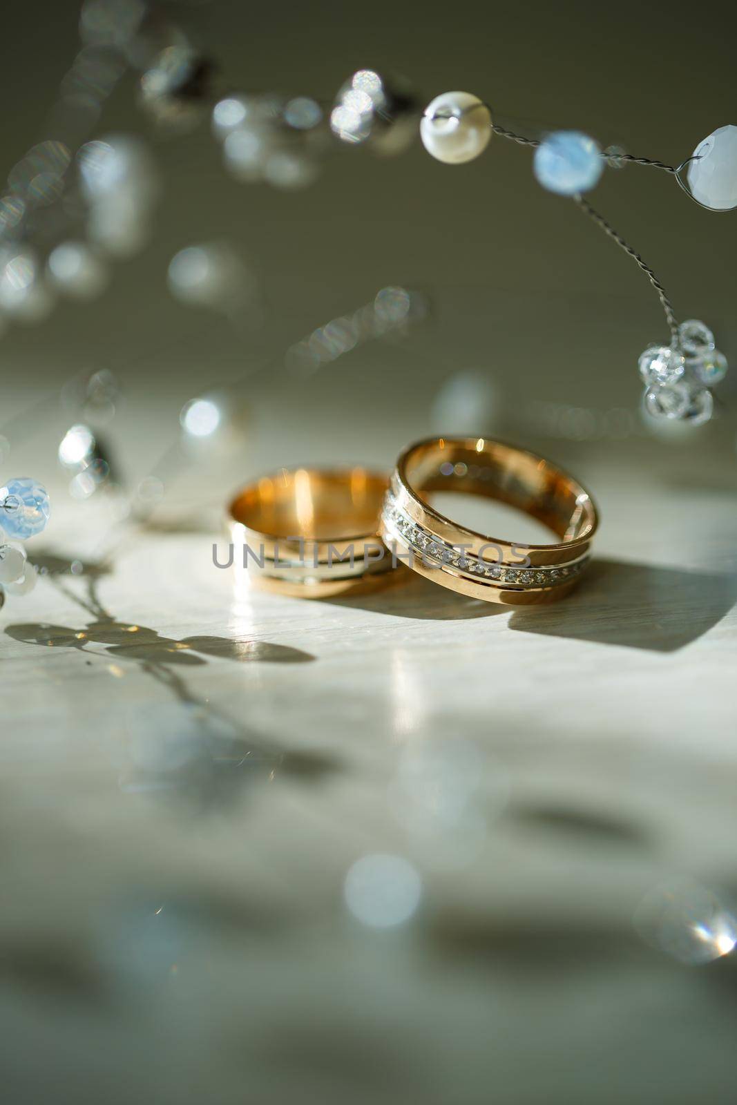 Gold wedding rings for newlyweds on wedding day