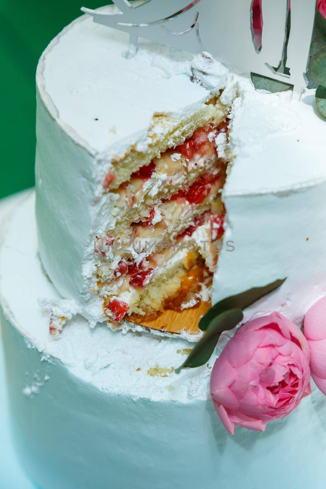 Big sweet wedding cake for newlyweds