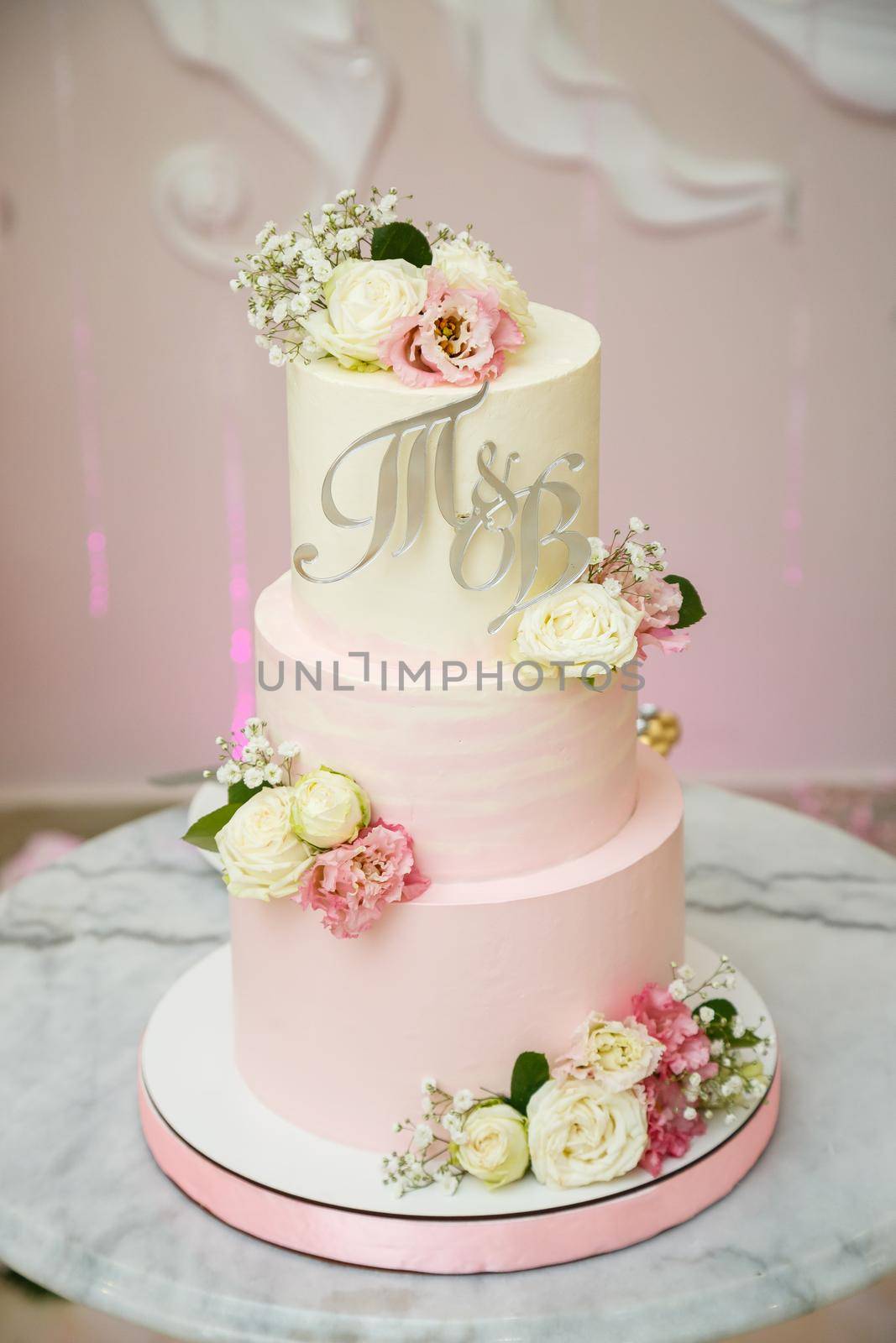 Beautiful tiered delicious dessert sweet cake for newlyweds.