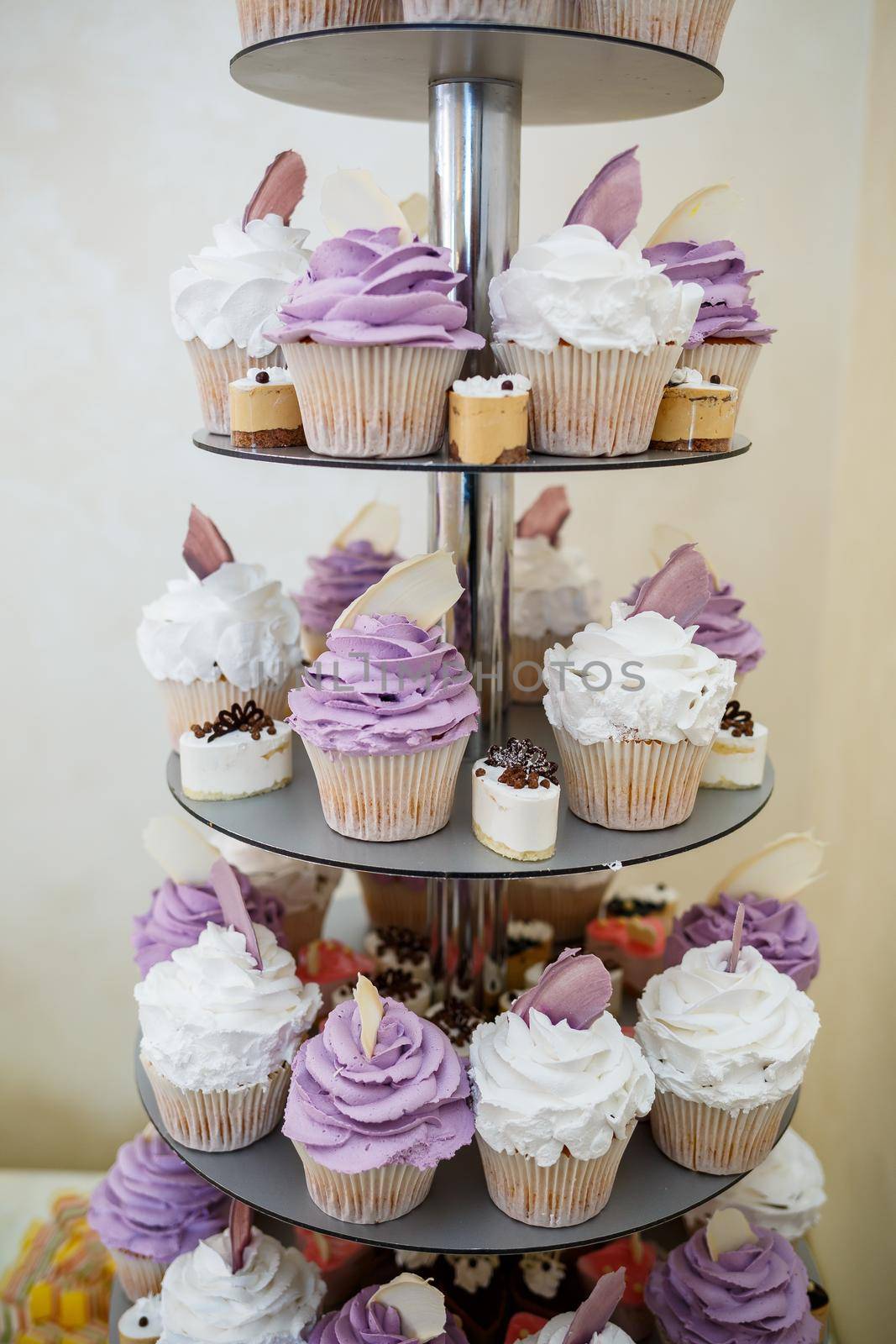 Big sweet wedding cake for newlyweds