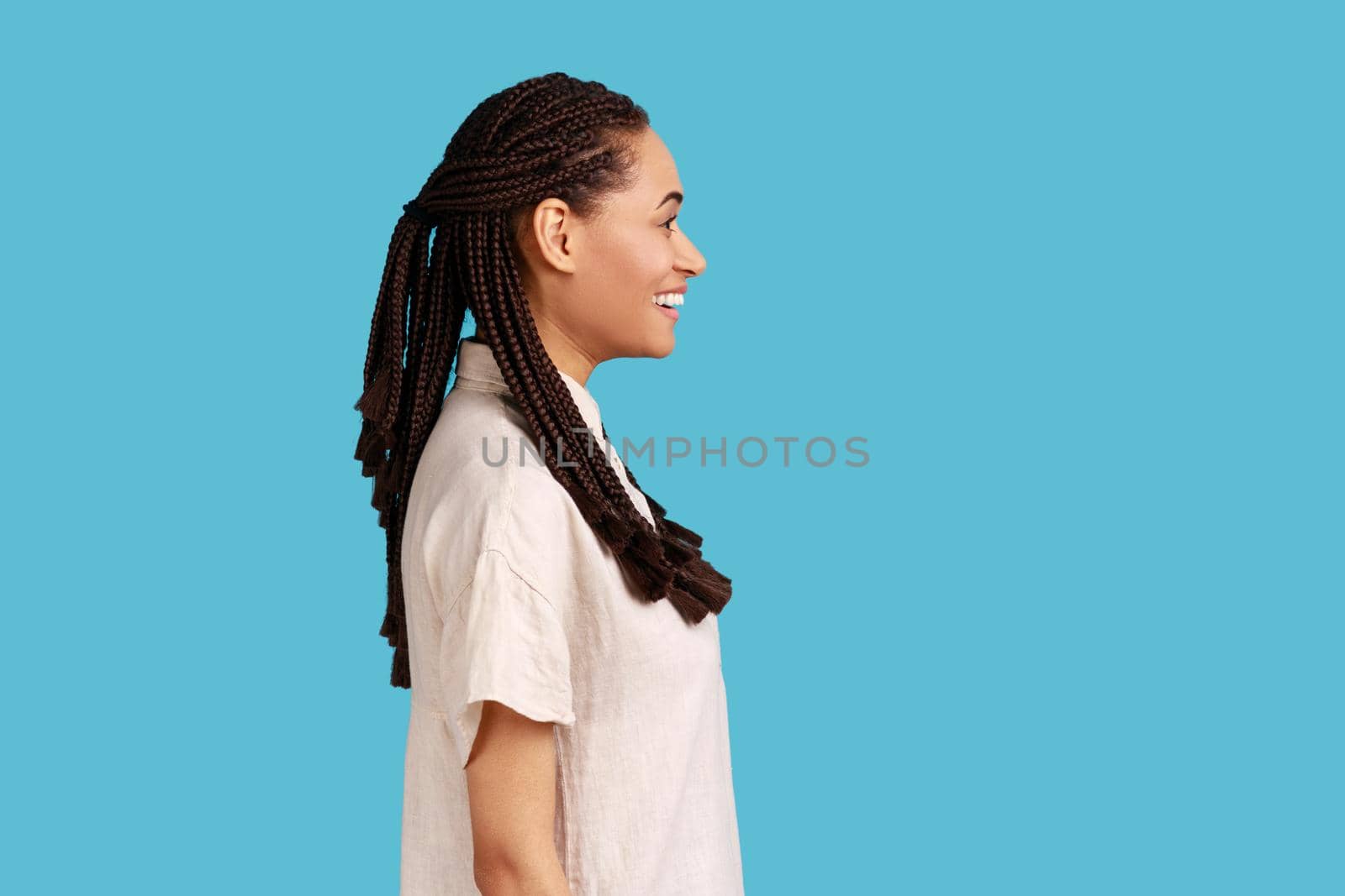 Woman with black dreadlocks, having positive optimistic emotions and charming engaging smile. by Khosro1