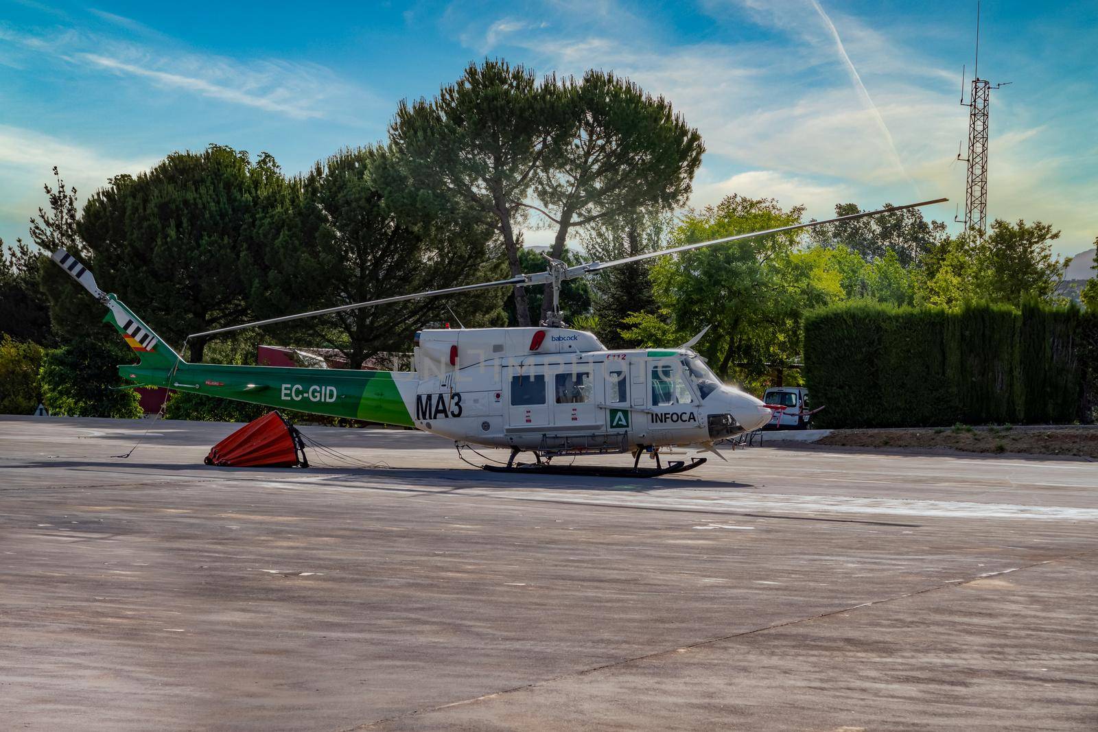 firefighting helicopter parked on its base by joseantona