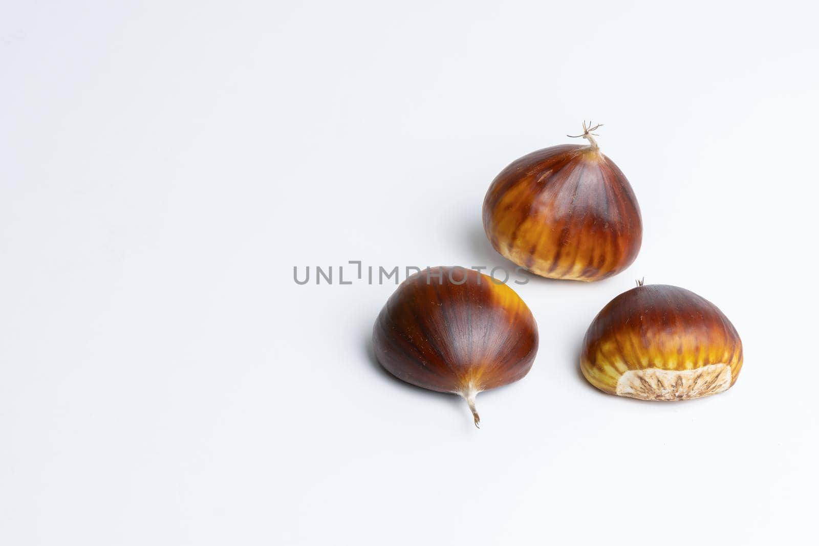 seasonal chestnuts harvested from the field on a white background