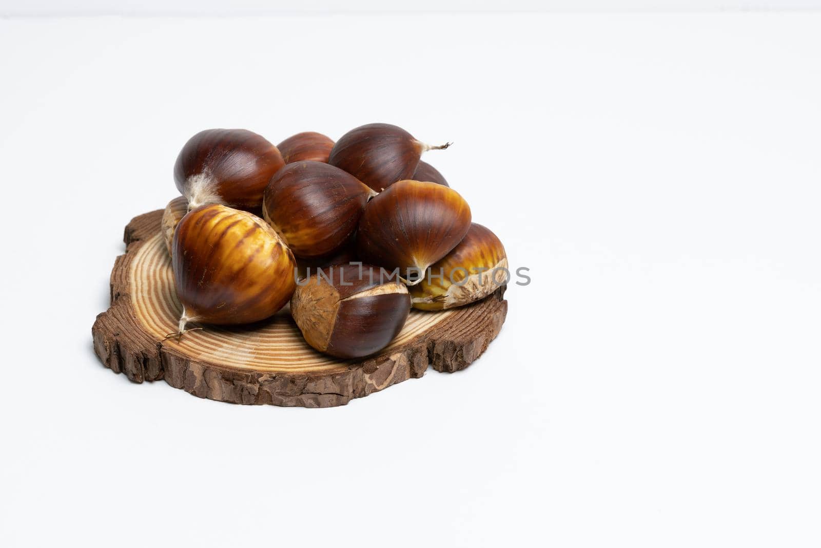 seasonal chestnuts harvested from the field on a white background