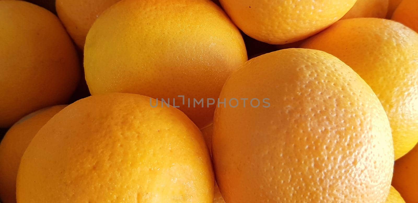 group of fresh orange fruits, tangerine good as background top view by antoksena