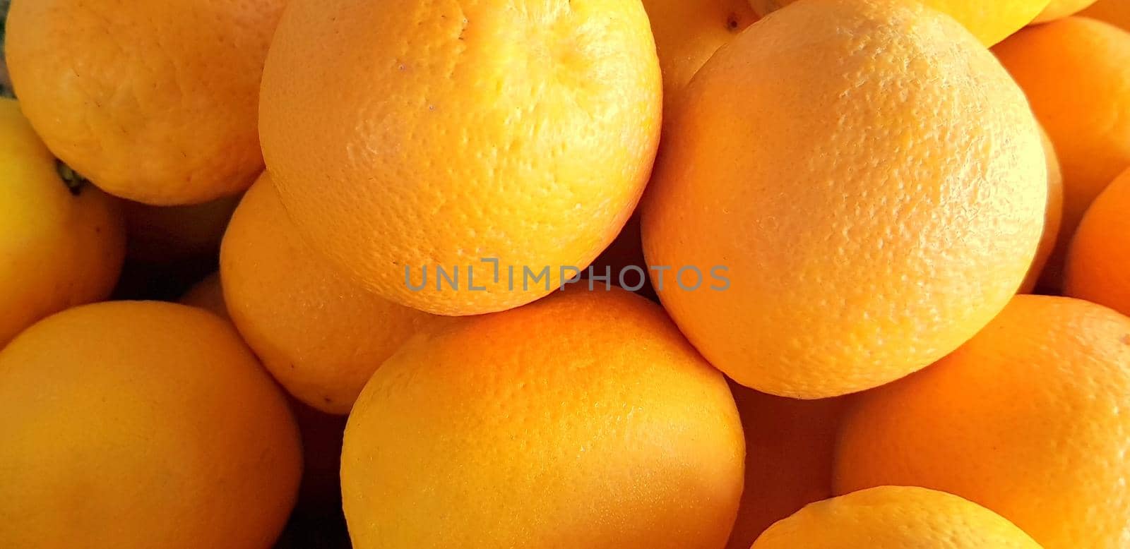 group of fresh orange fruits, tangerine good as background top view by antoksena