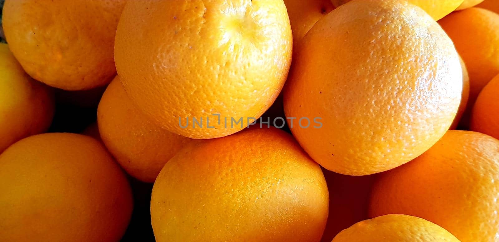 group of fresh orange fruits, tangerine good as background top view by antoksena