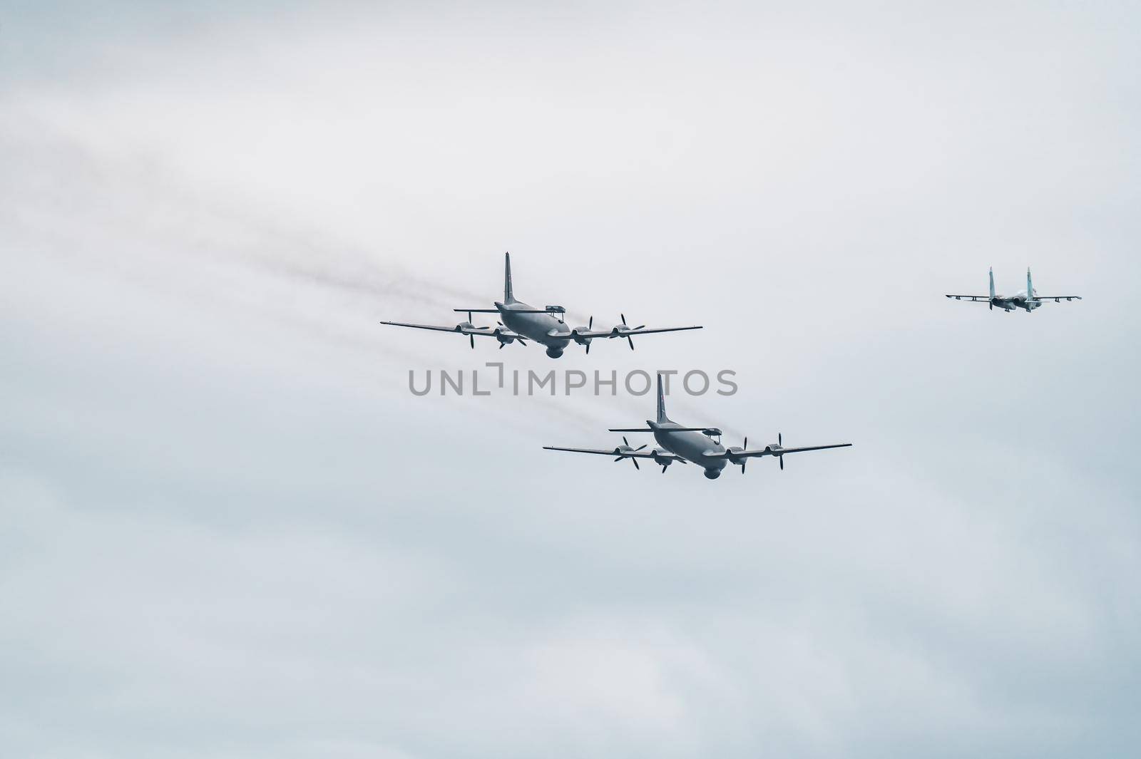 Russia, St. Petersburg, 28 July 2022: Military aircraft and helicopters of the air force fly on the city at the celebration of the Day of the Navy, amphibious and transport aircraft, anti-submarine. High quality photo