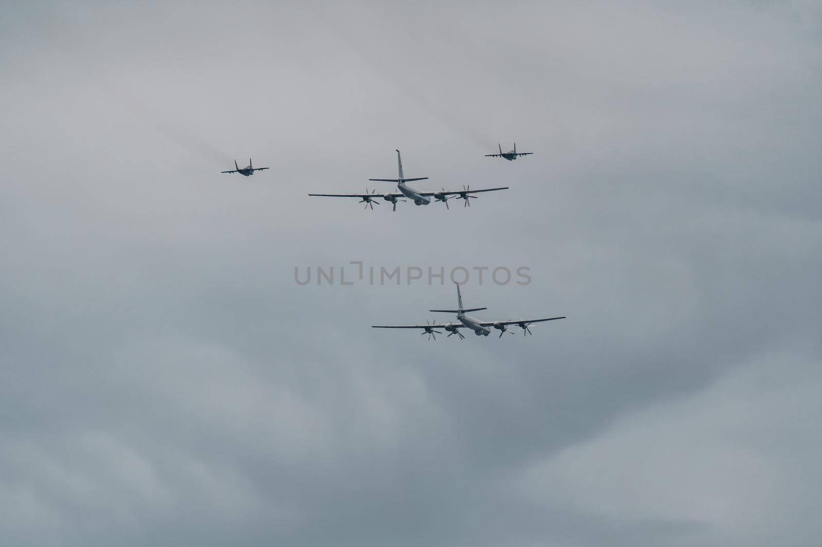 Russia, St. Petersburg, 28 July 2022: Military aircraft and helicopters of the air force fly on the city at the celebration of the Day of the Navy, amphibious and transport aircraft, anti-submarine. High quality photo