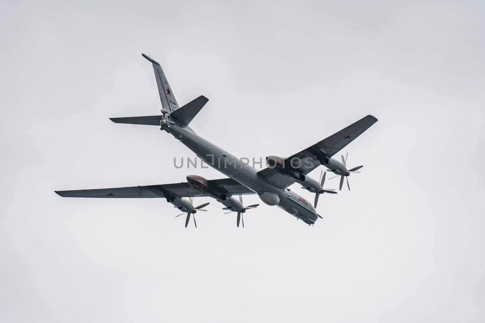 Russia, St. Petersburg, 28 July 2022: Military aircraft and helicopters of the air force fly on the city at the celebration of the Day of the Navy, amphibious and transport aircraft, anti-submarine. High quality photo