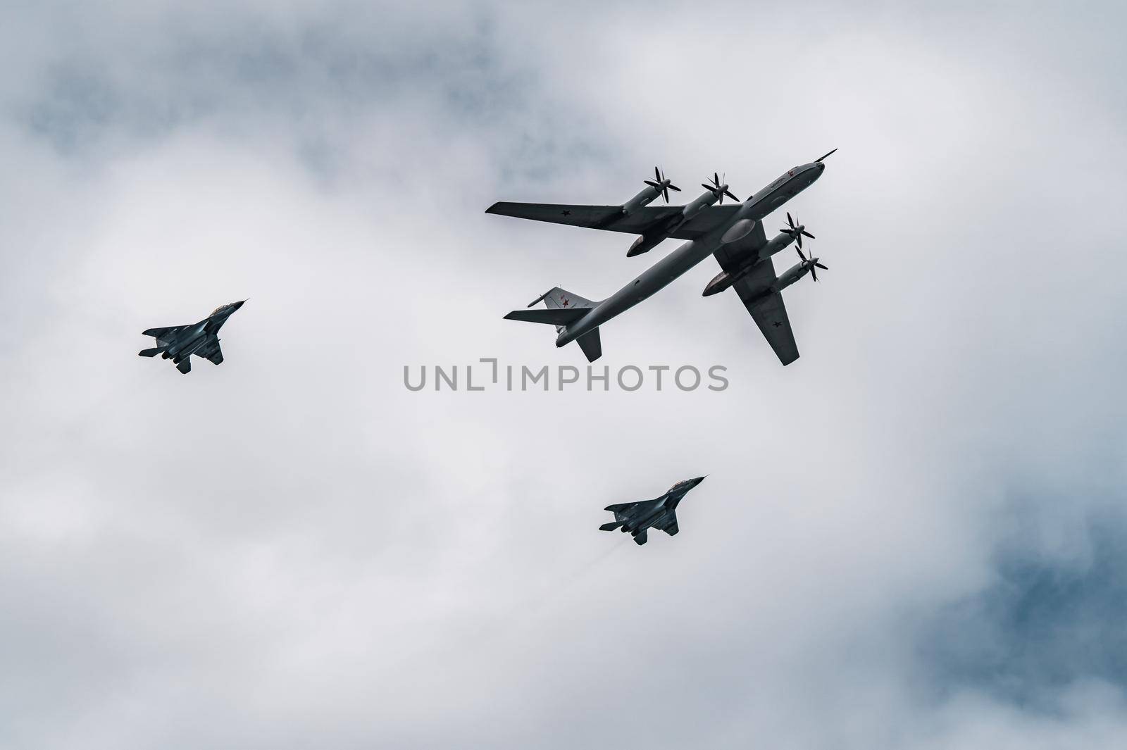 Russia, St. Petersburg, 28 July 2022: Military aircraft and helicopters of the air force fly on the city at the celebration of the Day of the Navy, amphibious and transport aircraft, anti-submarine. High quality photo