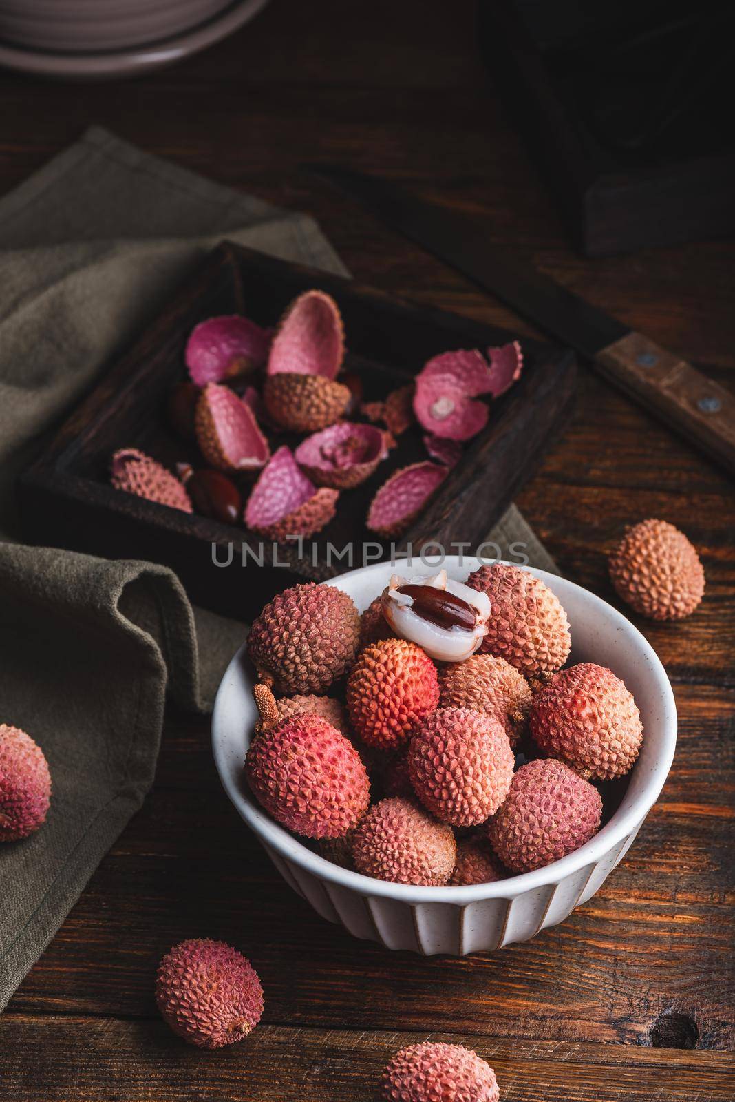 Fresh Lychees in Bowl by Seva_blsv