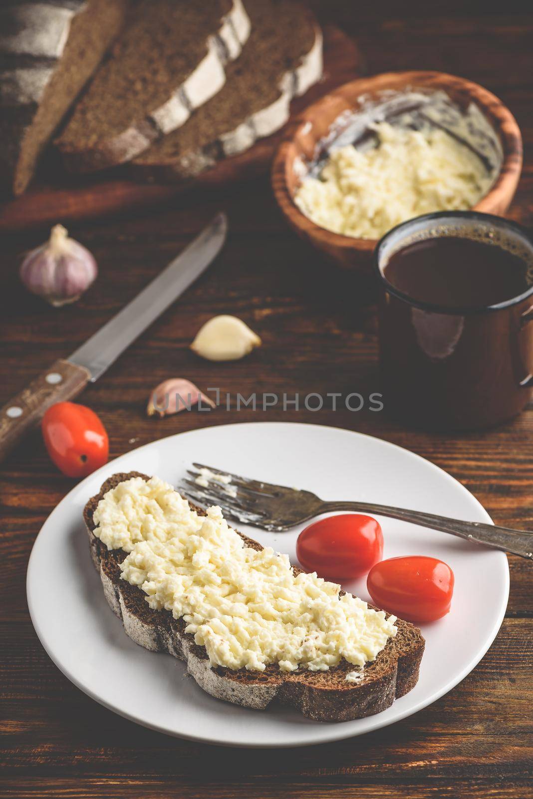 Rye bread toast with processed cheese and garlic by Seva_blsv