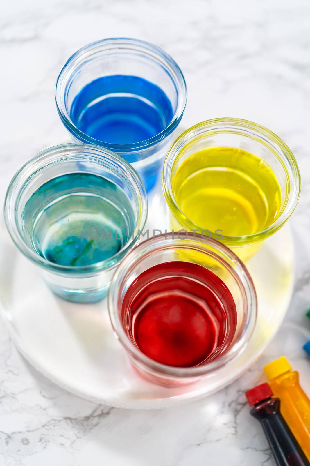 Coloring hard-boiled white eggs with natural food coloring.