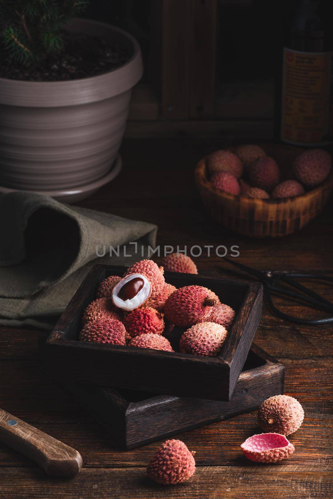 Delicious Lychee Fruits in Rustic Box by Seva_blsv