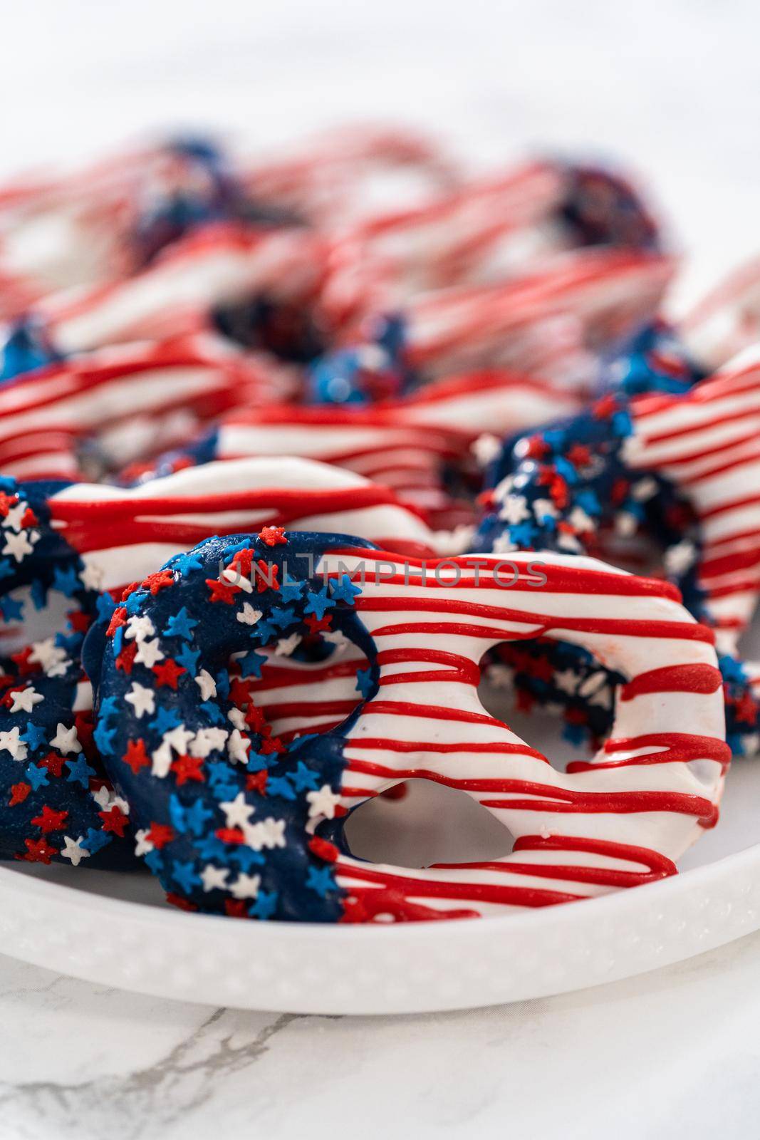 American flag. Red, white, and blue chocolate-covered pretzel twists.