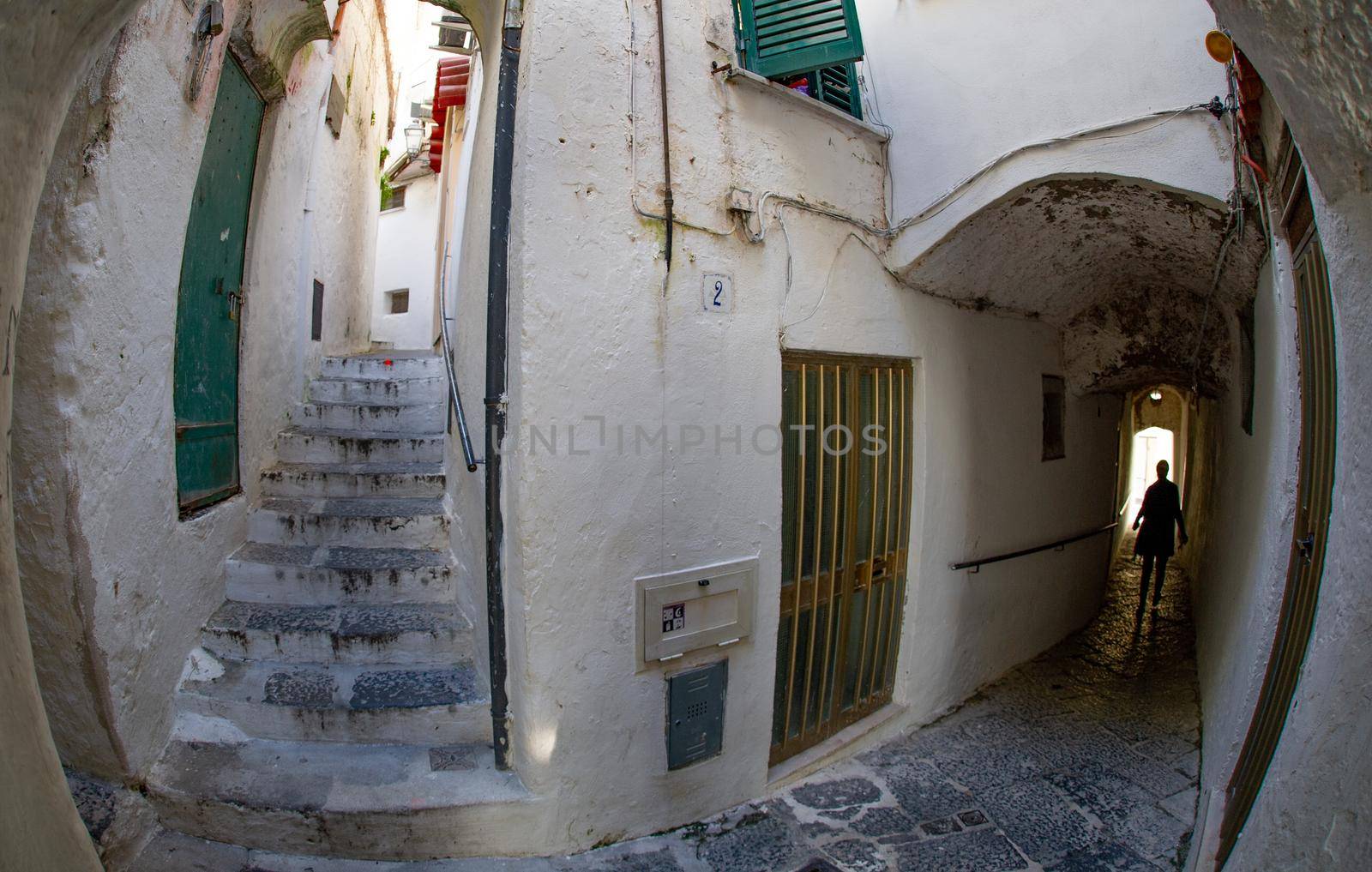 Narrow streets with many stairs going up and down in Positano Italy