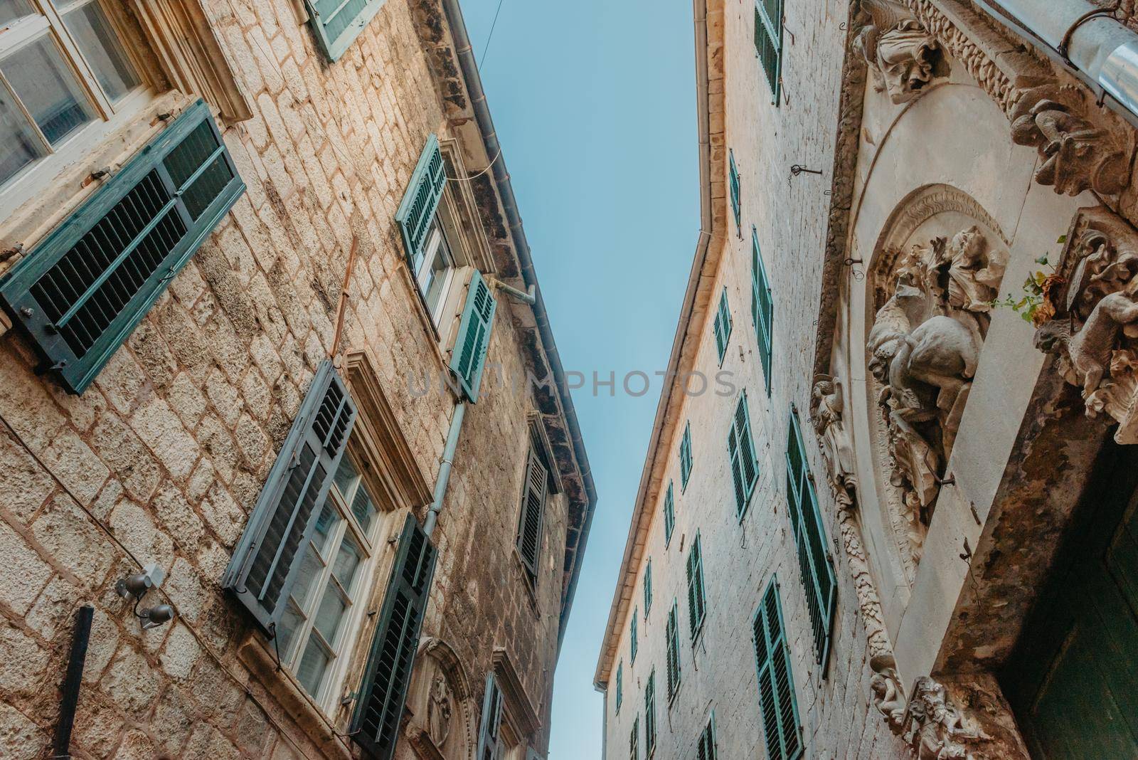 Ancient europian architecture. street in old town of Italy, Montenegro, Greece etc by Andrii_Ko