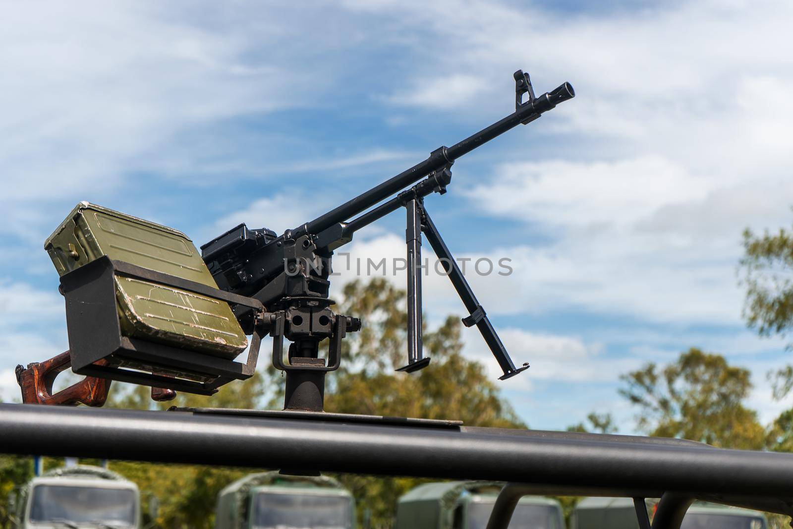 Machine gun mounted on a army combat vehicle