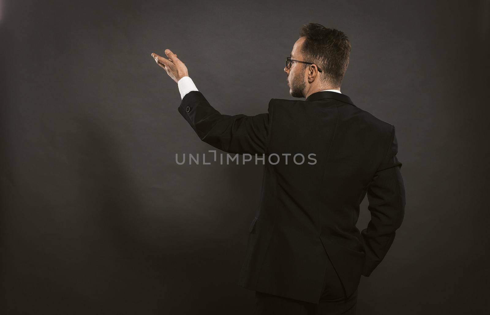 Businessman hand sign for concept design. by LipikStockMedia