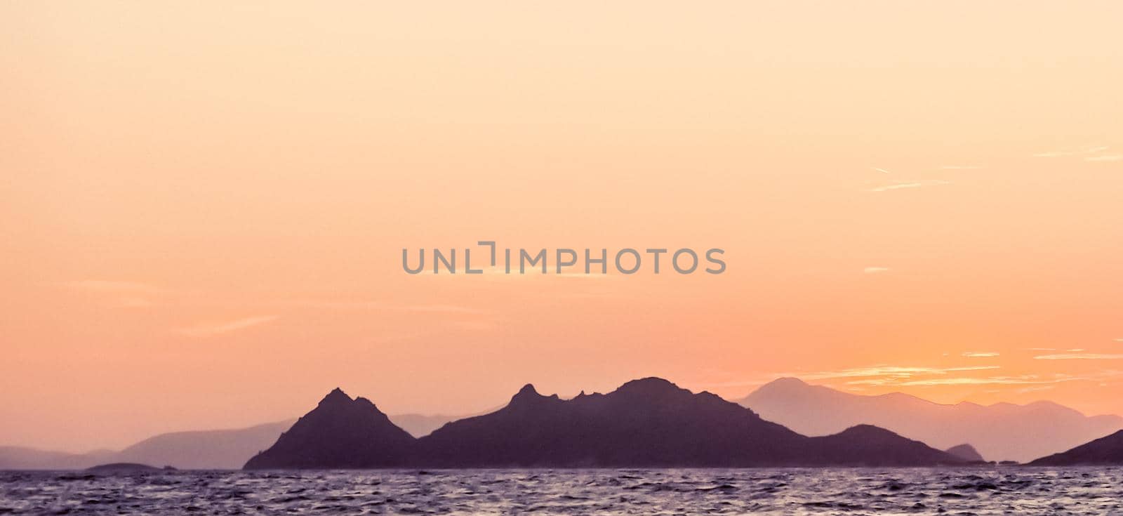 Summer sunset at the Mediterranean sea coast, seascape and mountain view by Anneleven
