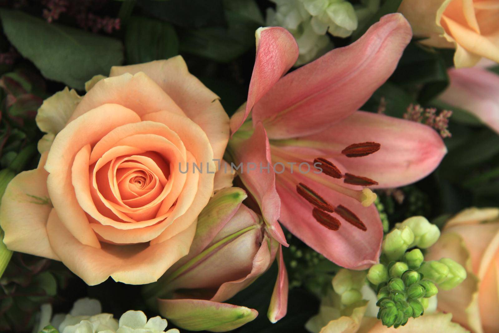 Pink flower arrangement: various flowers in different shades of pink for a wedding