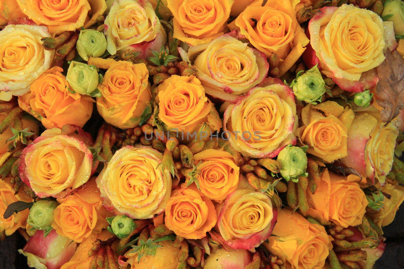 A yellow bridal floral arrangement for a wedding