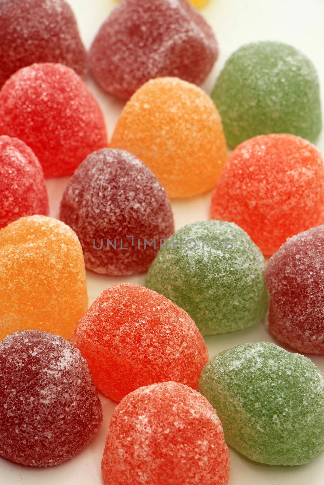 Sugared fruit candy in different shapes, colors and sizes by studioportosabbia