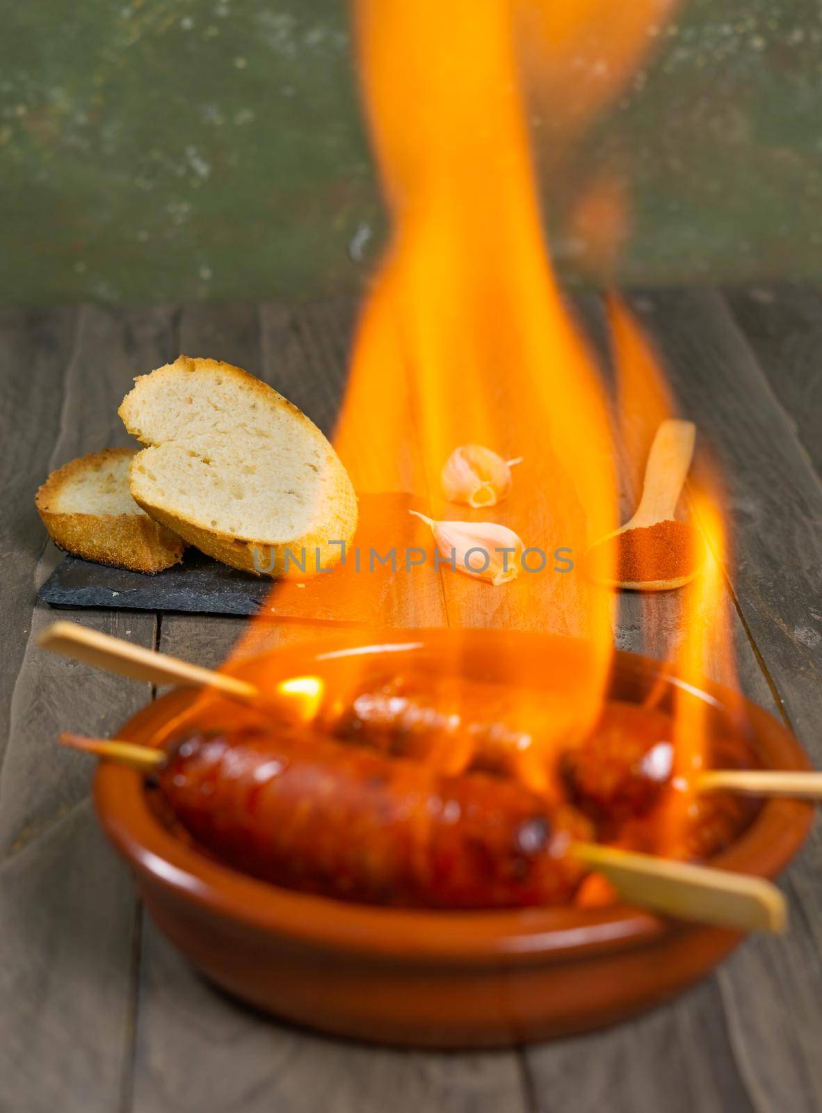 spicy chorizo to hell cooked over a fire right on the table