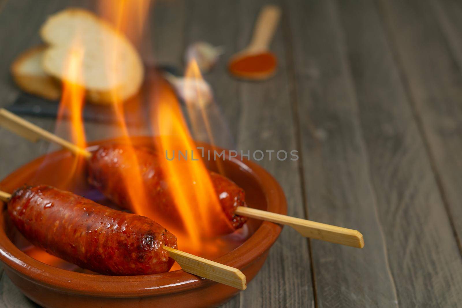 spicy chorizo to hell cooked over a fire right on the table