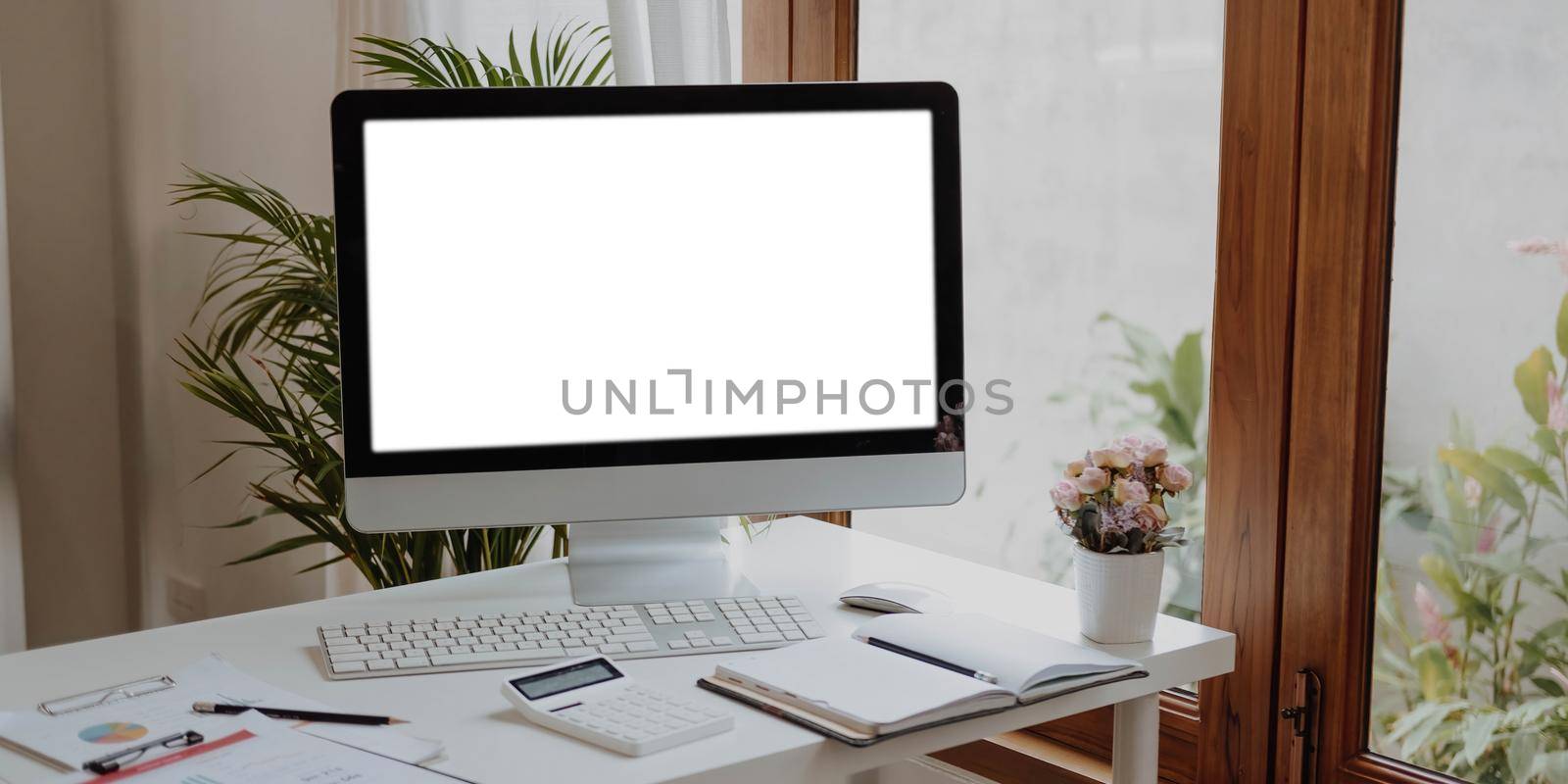 Workplace mockup concept. Mock up modern home decor desktop computer.Mockup desktop by wichayada