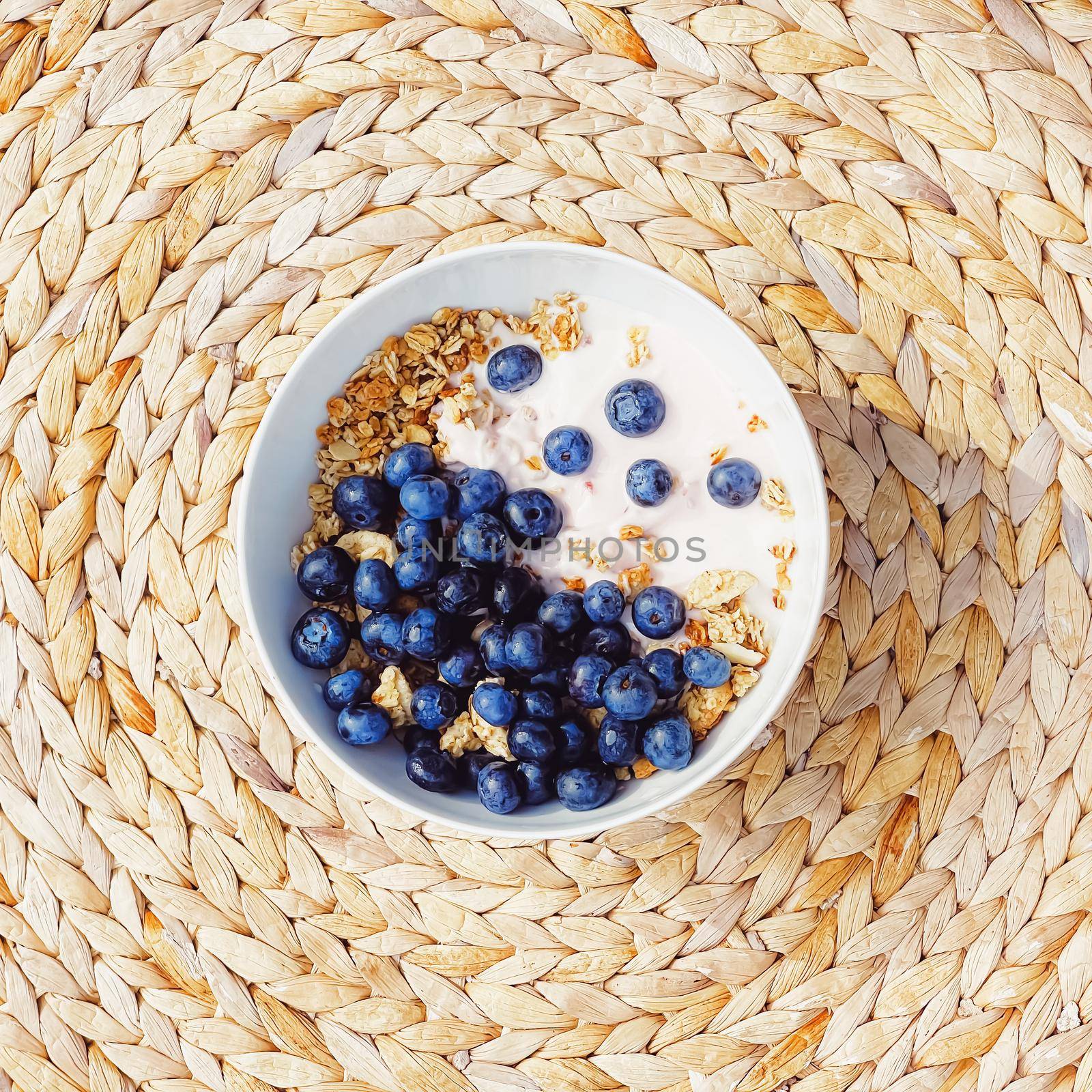 Blueberry yogurt cereal bowl as healthy breakfast and morning meal, sweet food and organic berry fruit, diet and nutrition by Anneleven