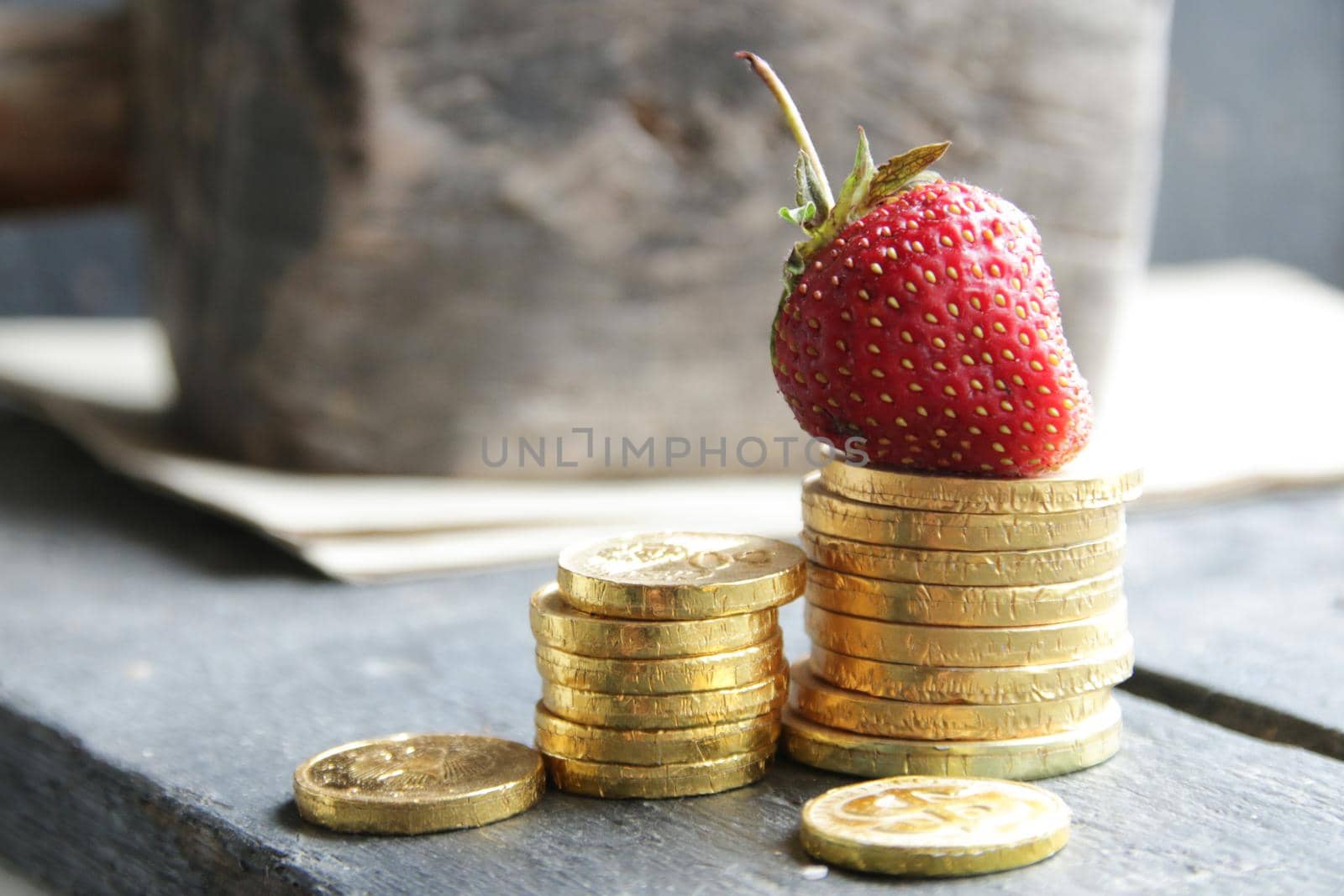 The concept of a successful business. Stacks of gold coins. by Markgraf