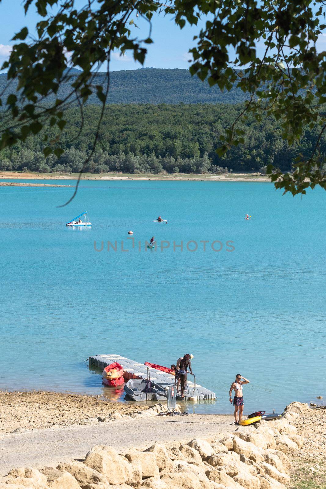 Montbel, France. 2022 August 2 . Sunset on Lake Montbel in Ariege with the boats in the summer of 2022.