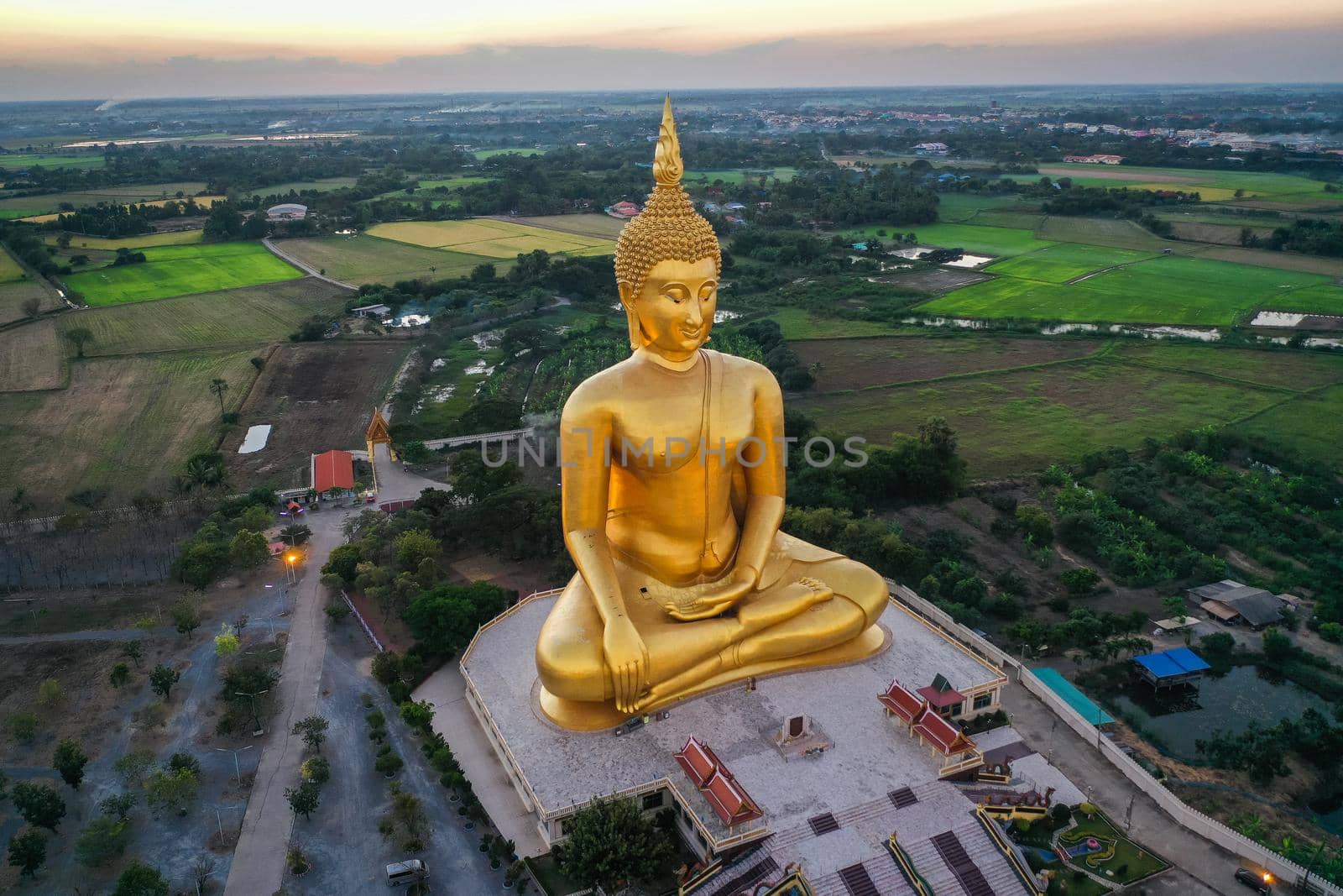 Big Buddha during sunset at Wat Muang in Ang Thong, Thailand, south east asia