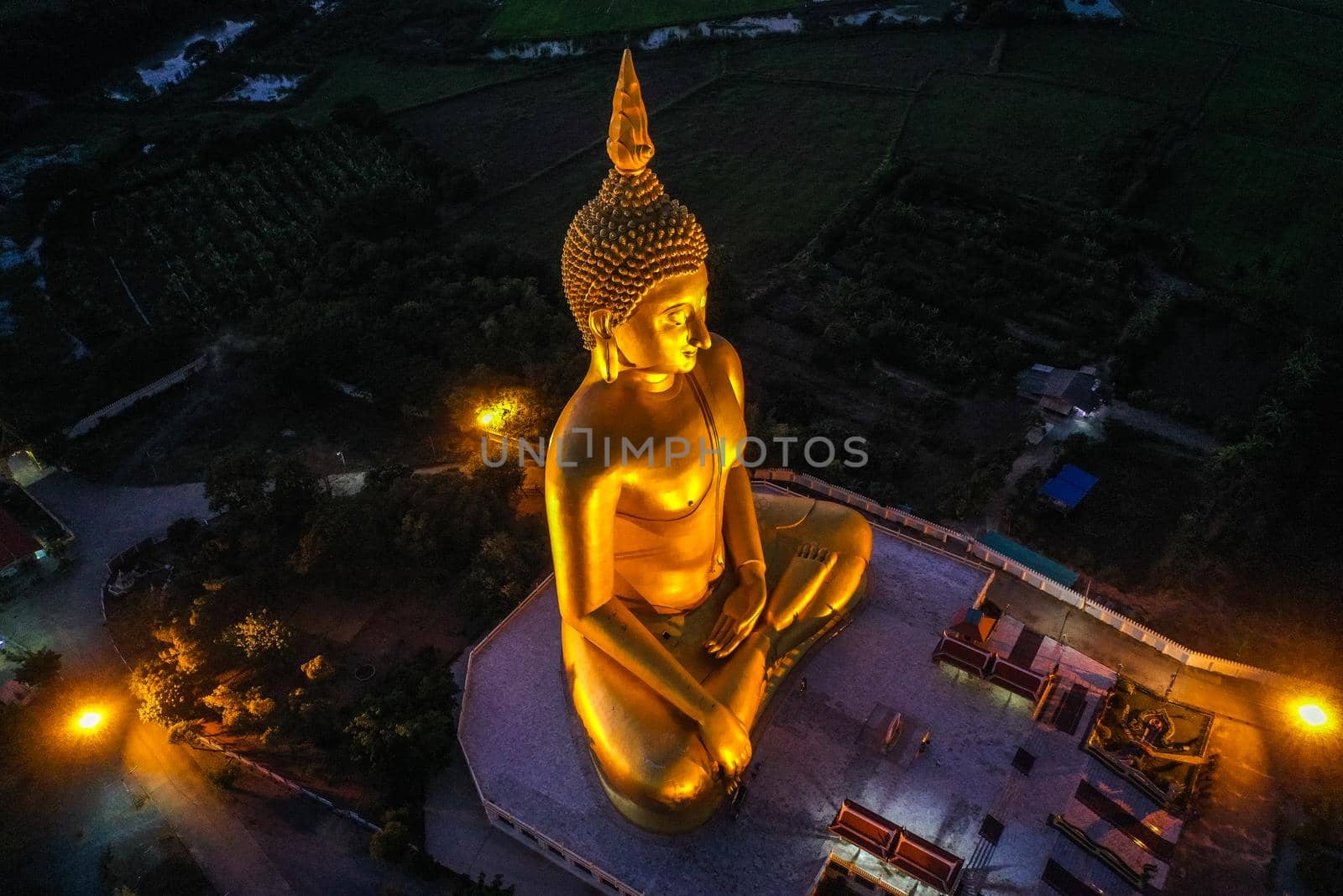 Big Buddha during sunset at Wat Muang in Ang Thong, Thailand, south east asia