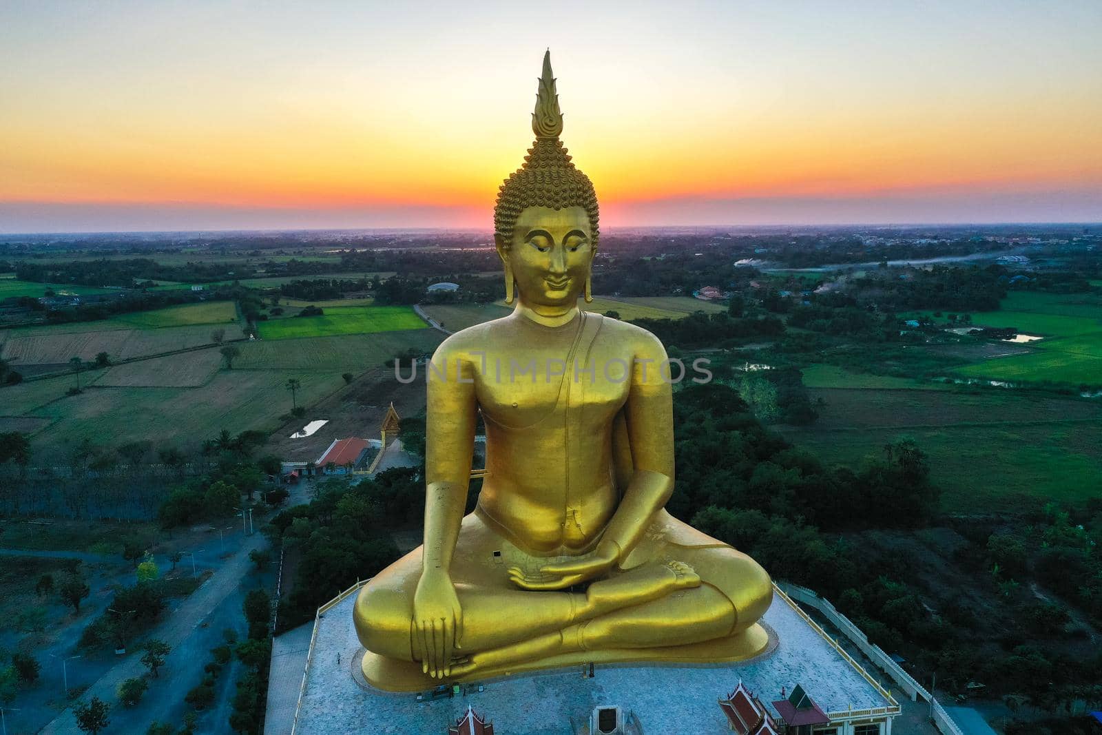 Big Buddha during sunset at Wat Muang in Ang Thong, Thailand, south east asia