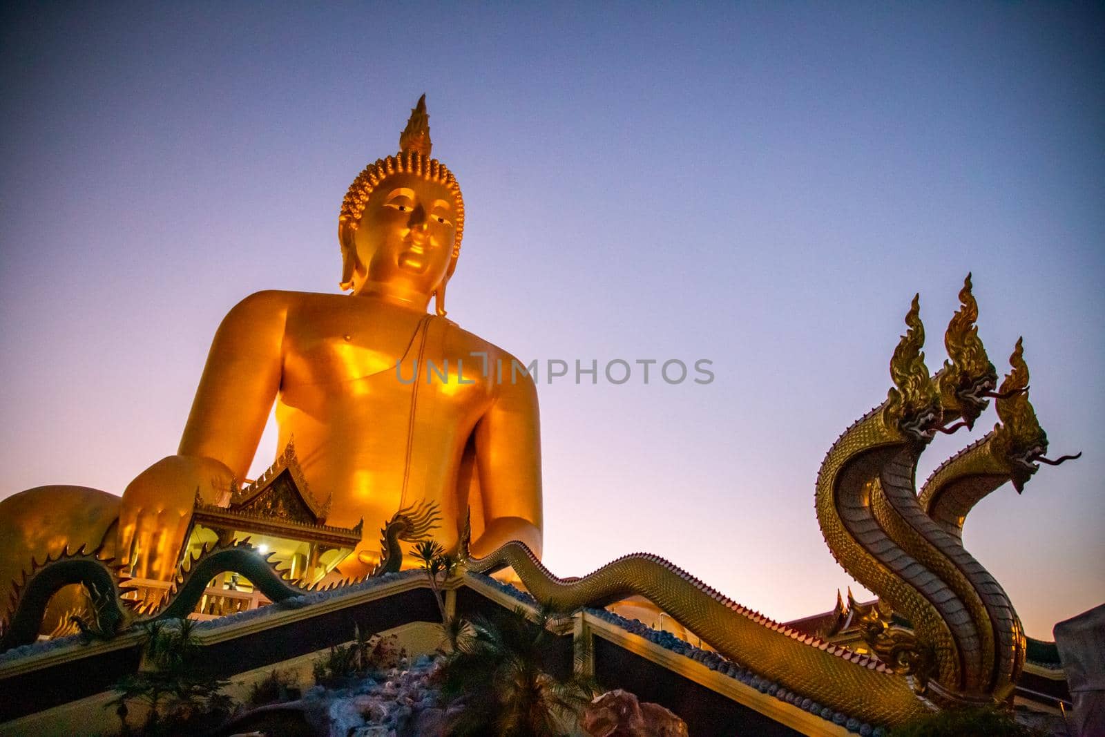 Big Buddha during sunset at Wat Muang in Ang Thong, Thailand, south east asia