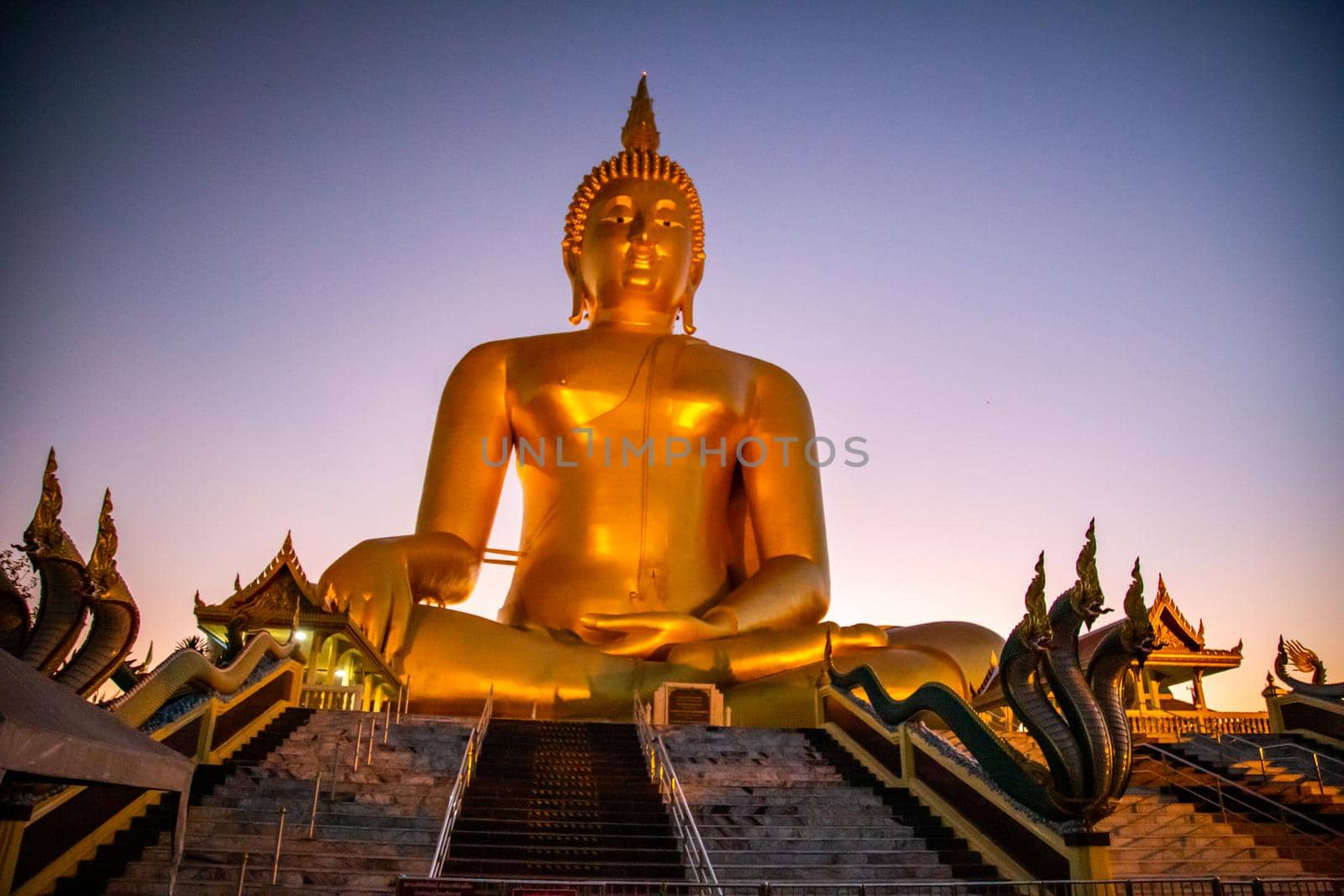 Big Buddha during sunset at Wat Muang in Ang Thong, Thailand, south east asia