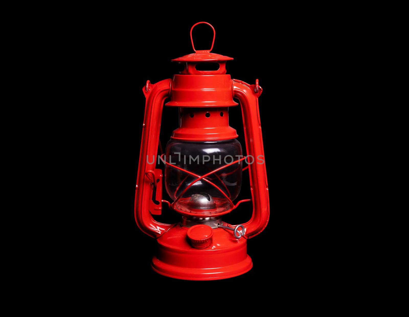 red kerosene lamp on a black background, isolated object, close-up, cut out by Ramanouskaya
