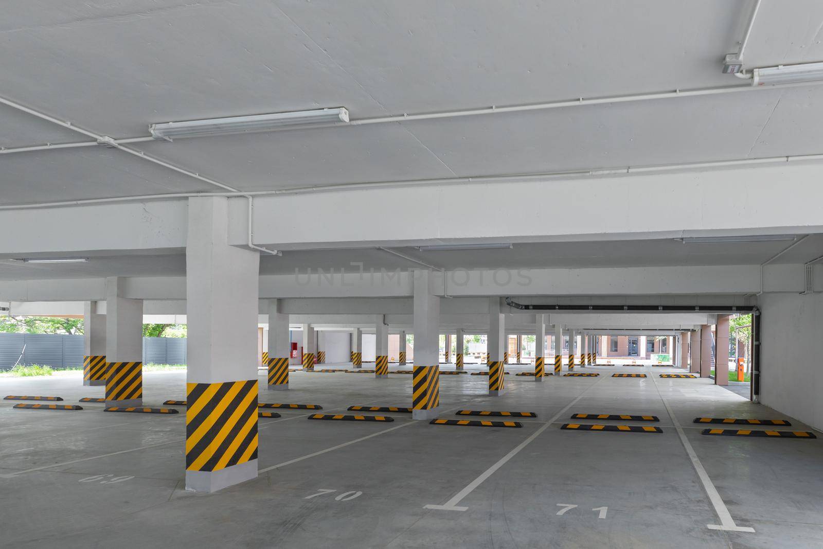 Empty ground parking in the yard of a modern house. New building.