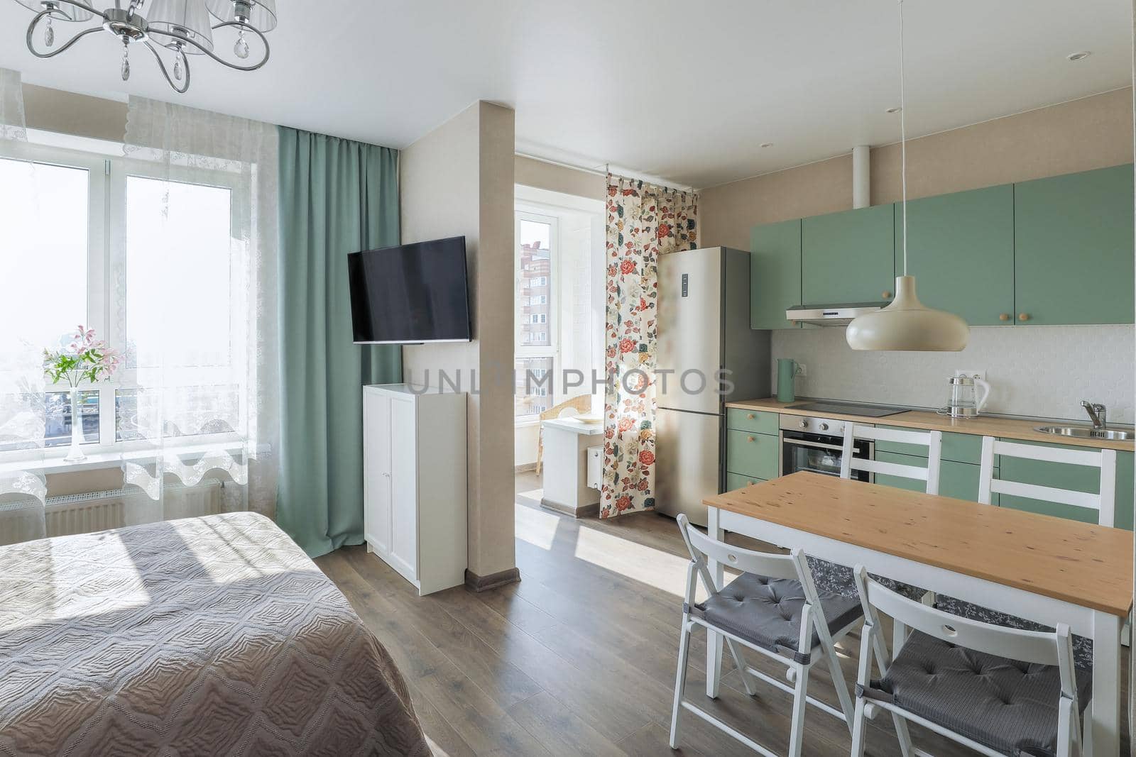 A modern small-sized apartment in a high-rise building. Apartment for a small family